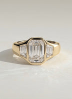 The Maren Ring - Emerald Three Stone Bezel Ring
