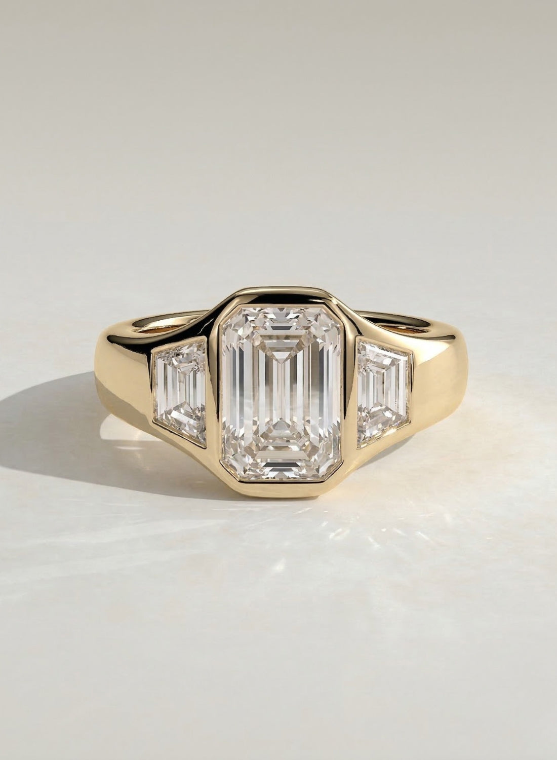 The Maren Ring - Emerald Three Stone Bezel Ring