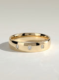 The Lucas Band - Three Stone Bezel Diamond Band