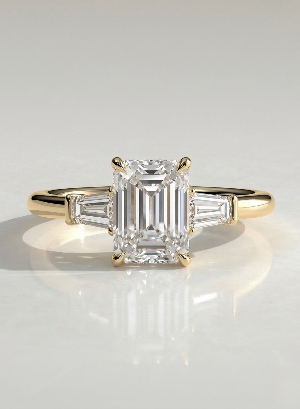The Victoria Ring - Emerald Three Stone DIamond Ring