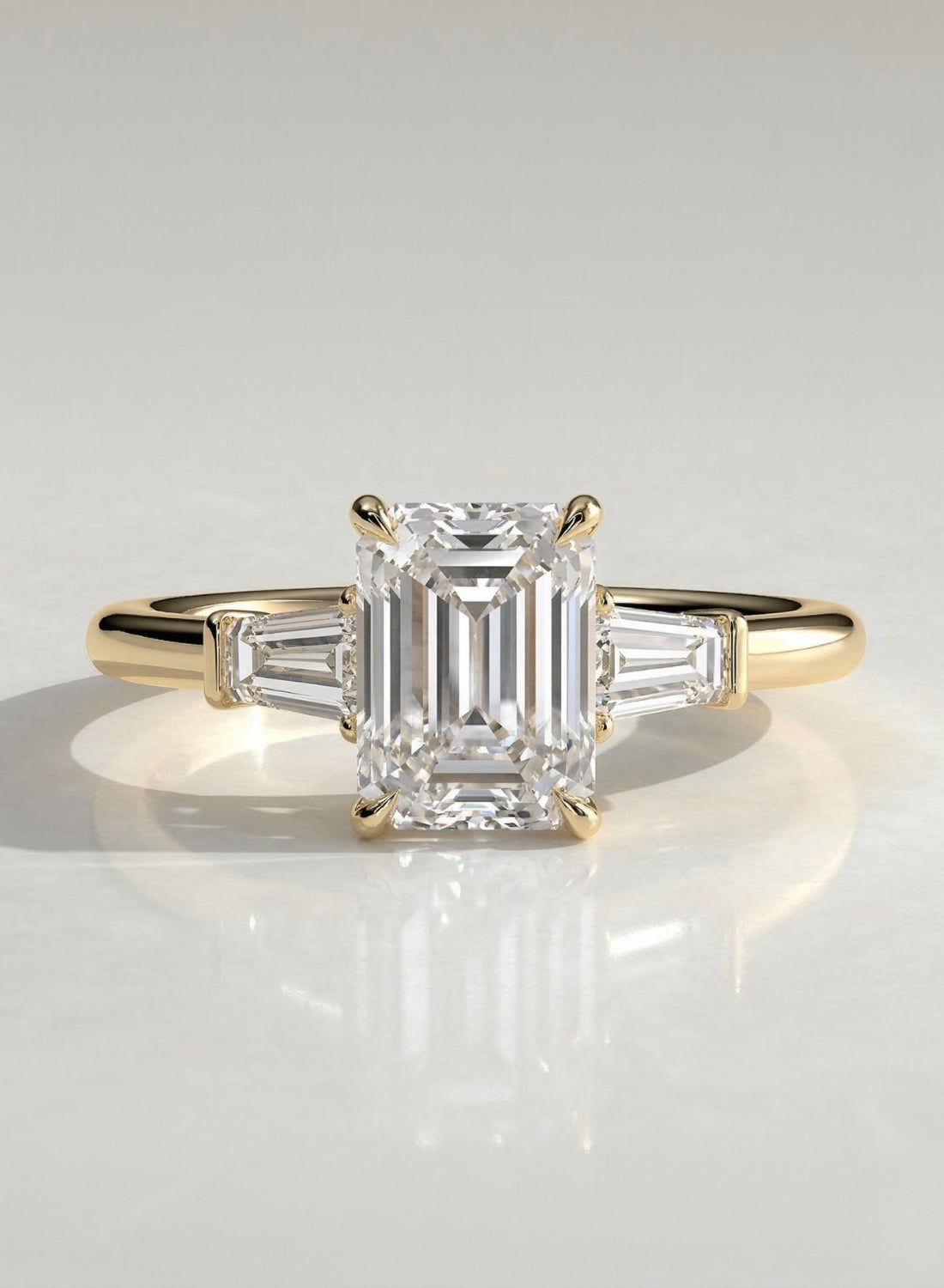 The Victoria Ring - Emerald Three Stone DIamond Ring