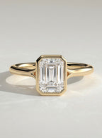 The Anya Ring - Petite Emerald Bezel Ring