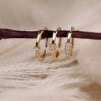 Baguette Row Huggie Earrings