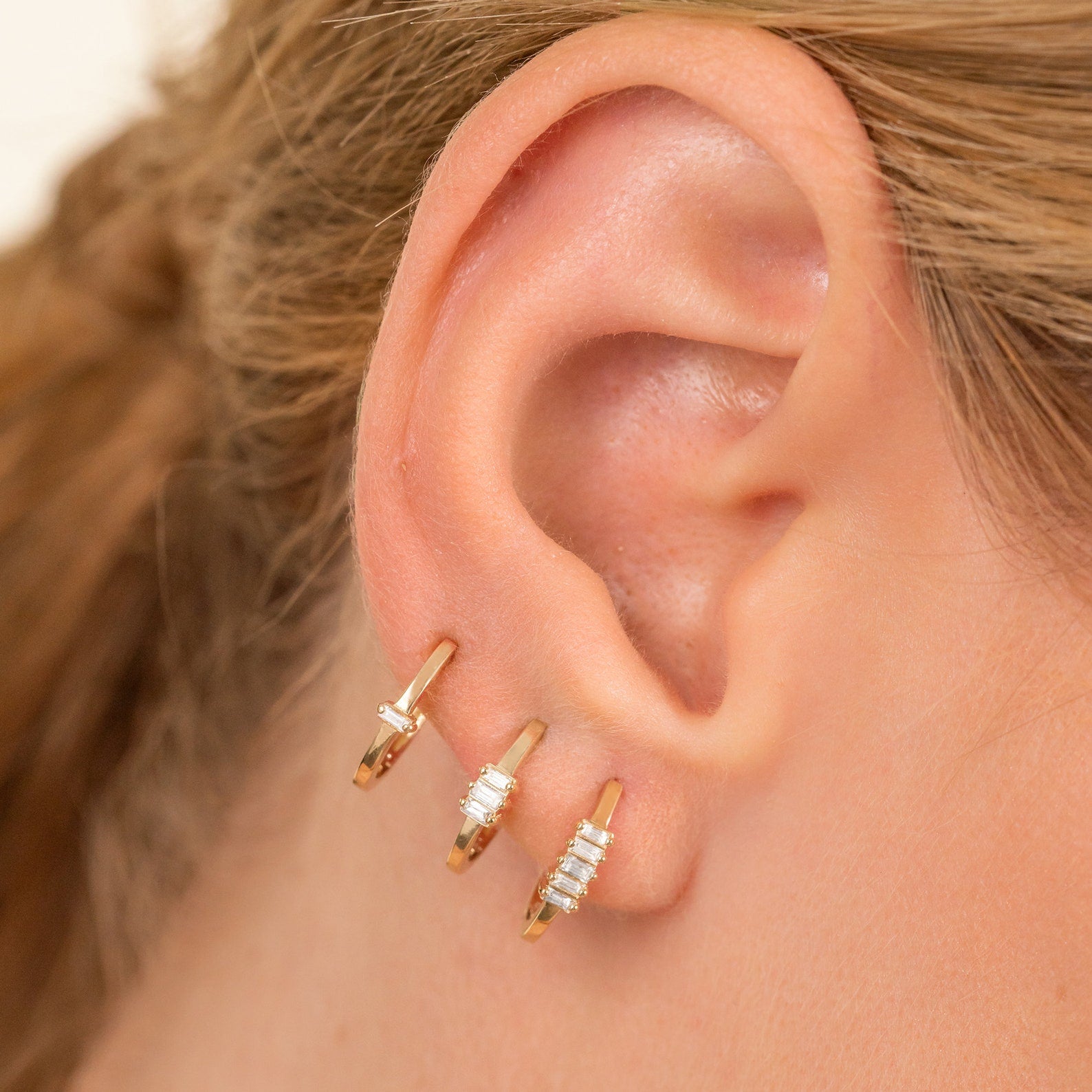 Baguette Row Huggie Earrings