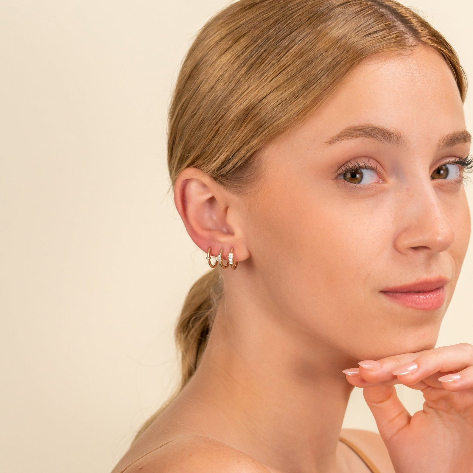 Baguette Row Huggie Earrings