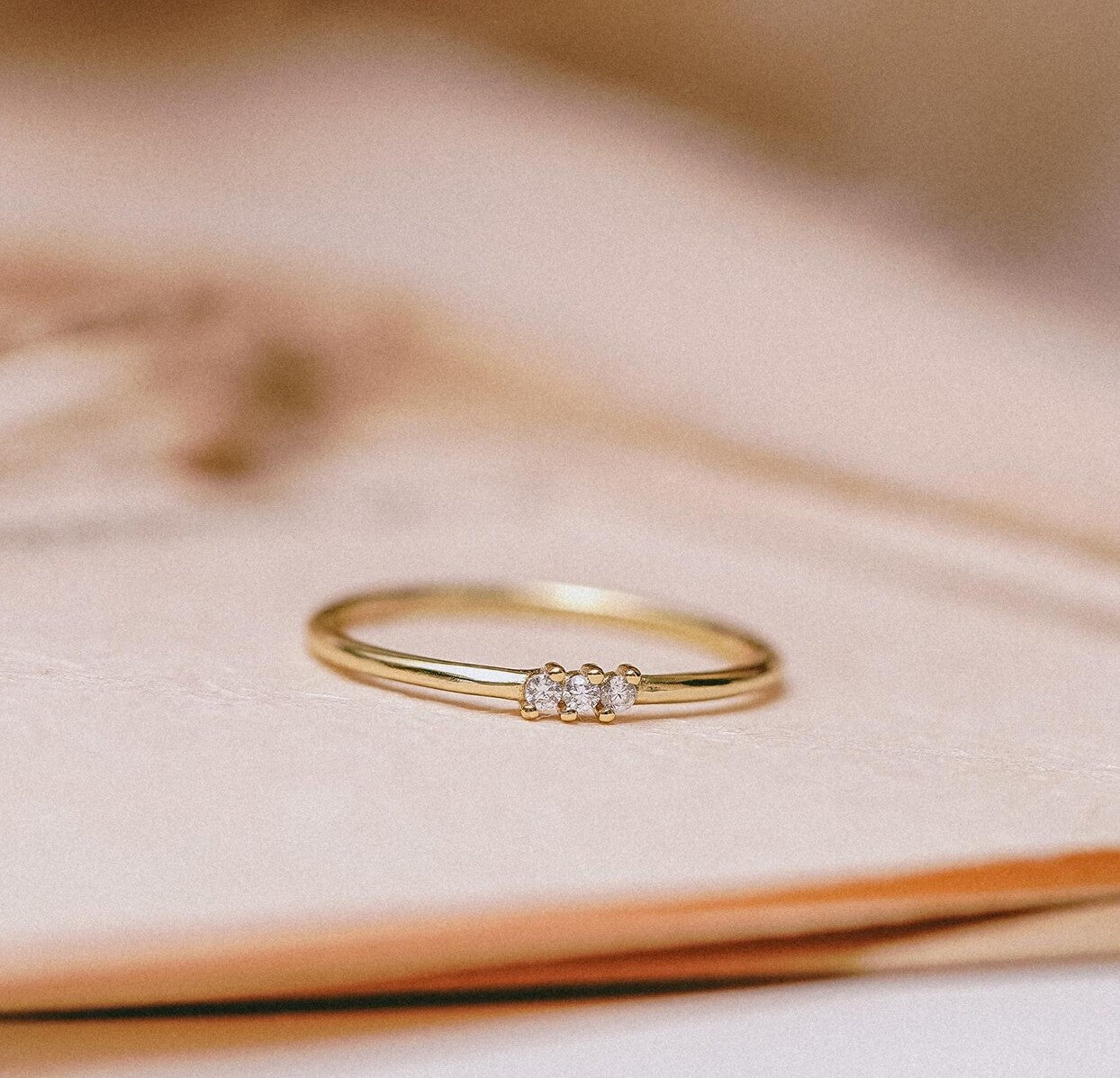 Minimal Three Diamond Cluster Ring