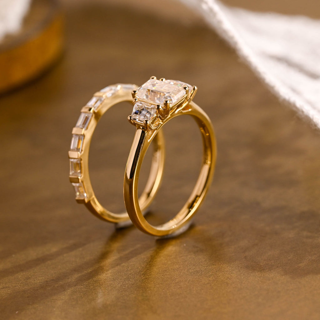 The Astoria Bridal Set - Emerald Cut Three Stone Ring with Baguette Band