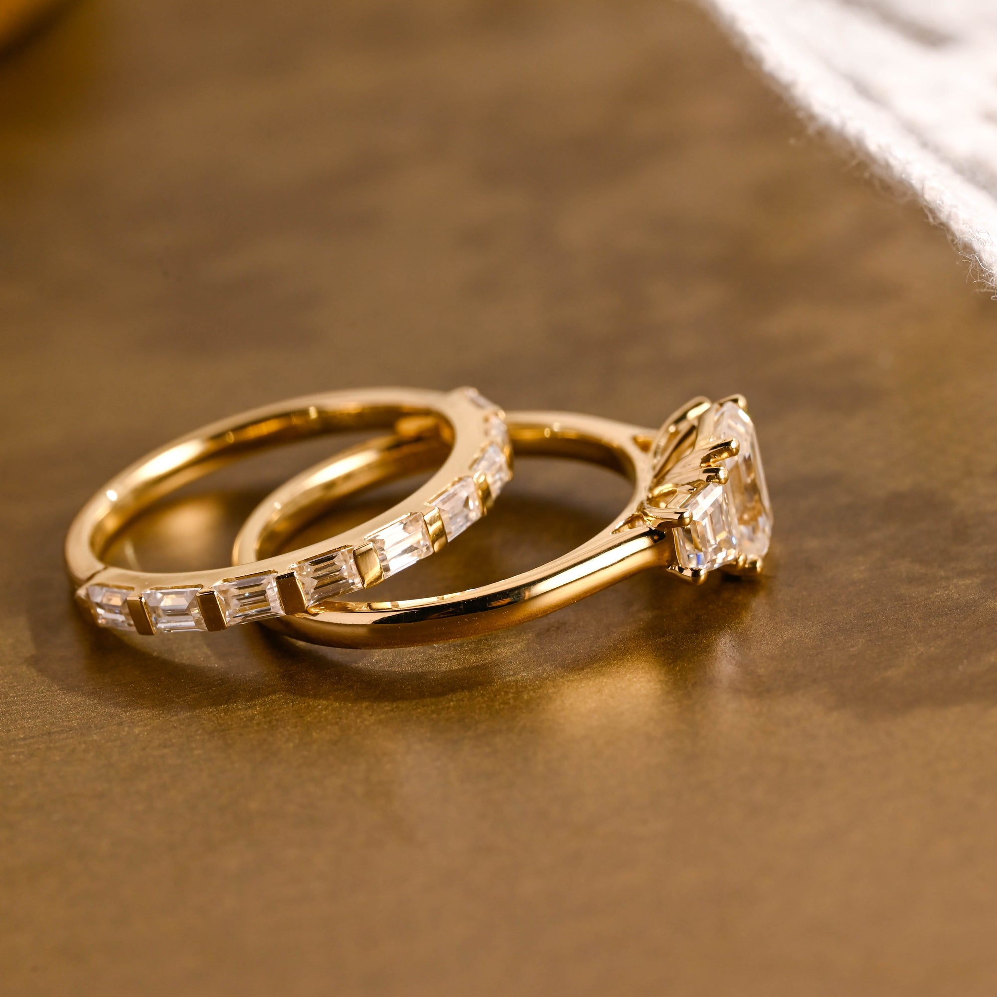 The Astoria Bridal Set - Emerald Cut Three Stone Ring with Baguette Band