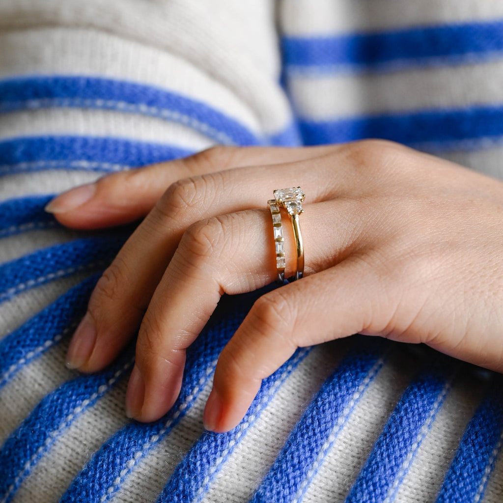 The Astoria Bridal Set - Emerald Cut Three Stone Ring with Baguette Band