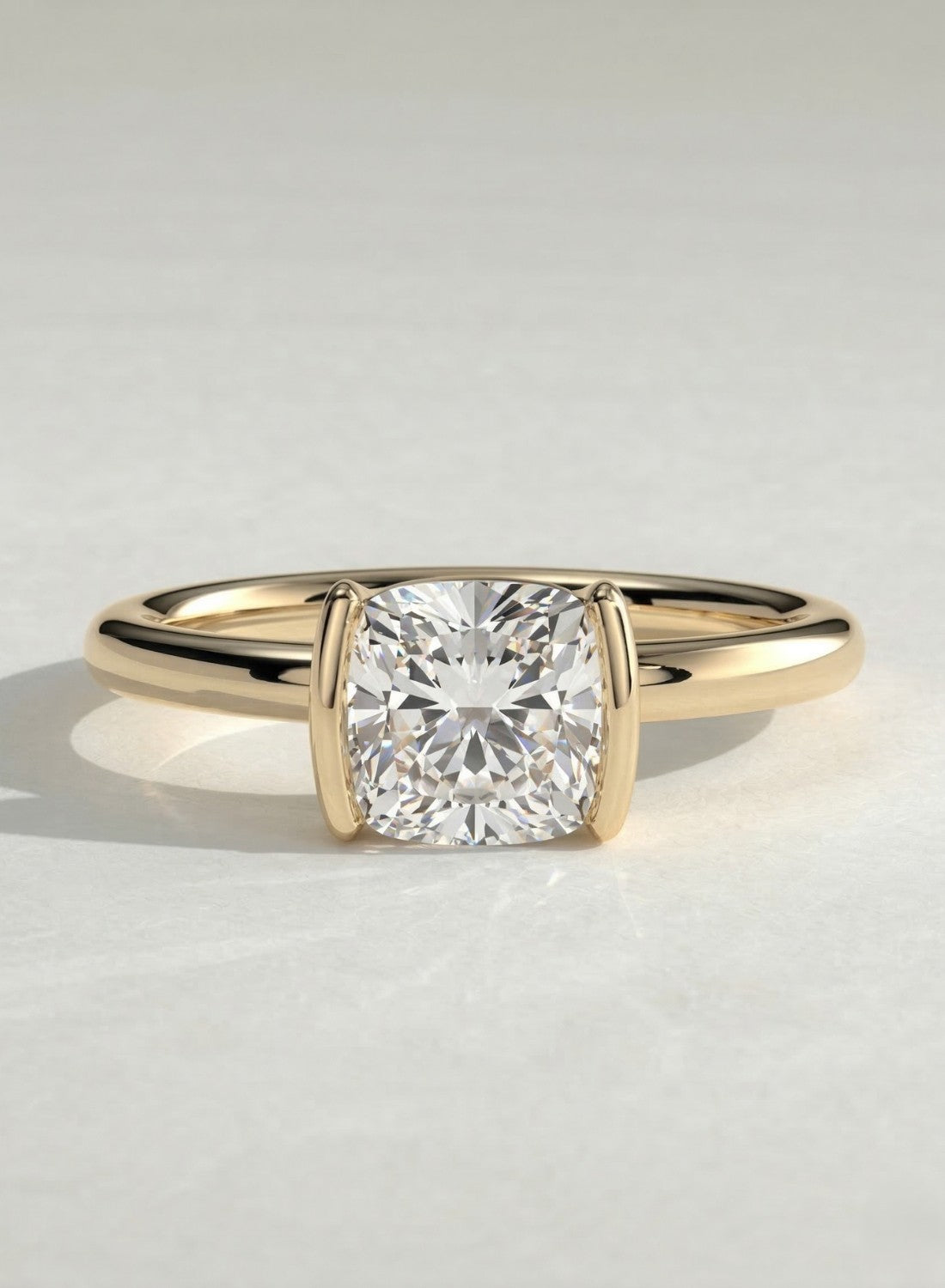 The Blair Ring – Cushion Cut Half Bezel Solitaire Engagement Ring