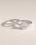 The Eliana Bridal Set - Pear Three Stone Ring with Pavé Wedding Band