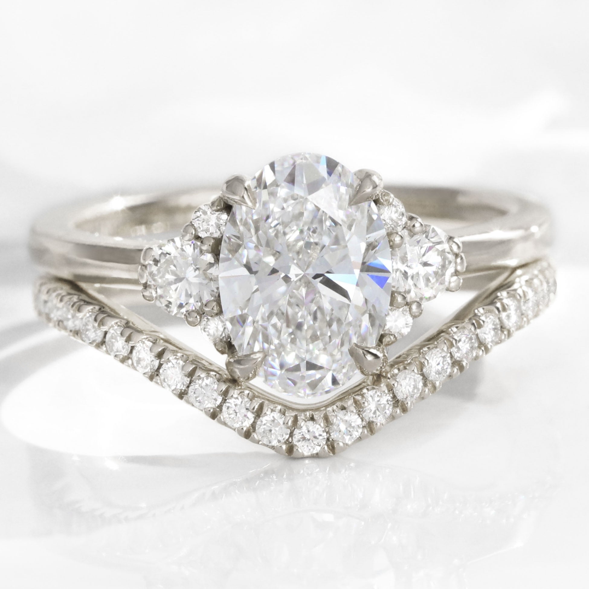 The Evelina Bridal Set - Oval Three Stone Diamond Ring with Contour Band