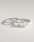 The Geneva Bridal Set - Emerald Cut Three Stone Ring with Pavé Wedding Band