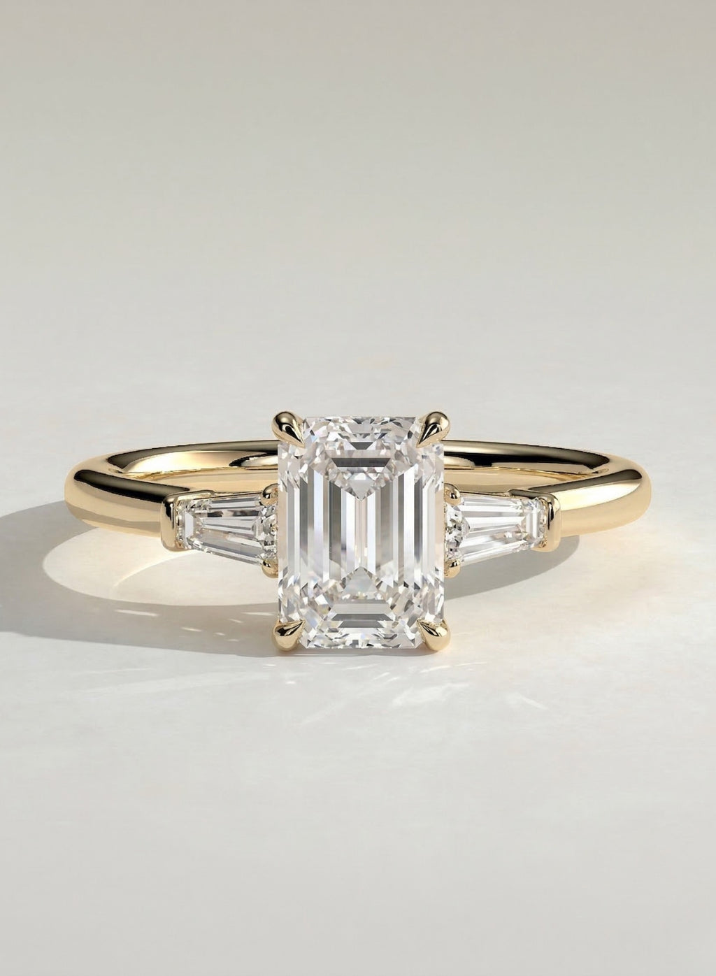 The Holly Ring - Emerald & Baguette Three Stone Ring