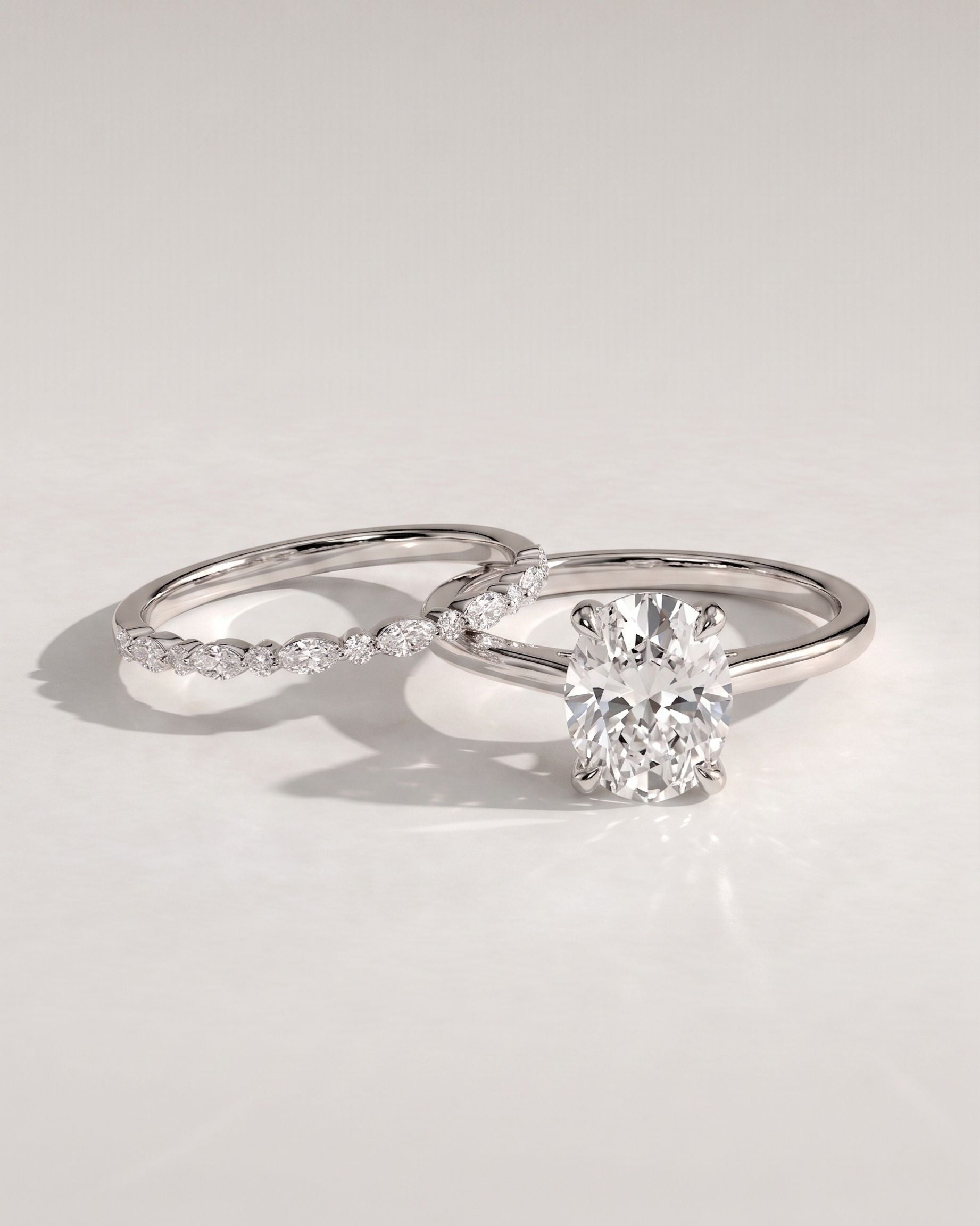 The Liora Bridal Set - Oval Diamond Ring with Marquise Leaf Wedding Band