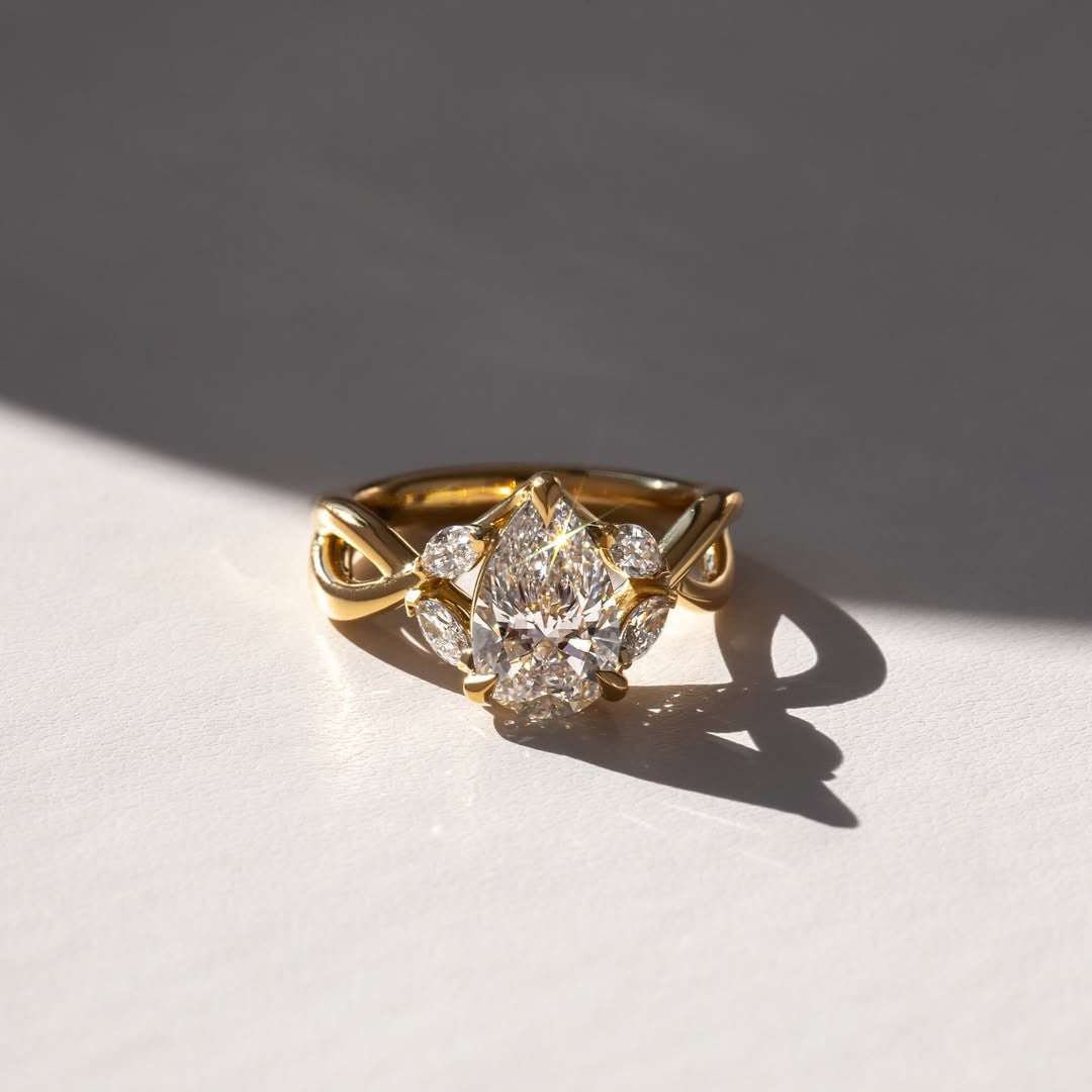 The Swirl Ring - Pear Twisted Band Engagement Ring