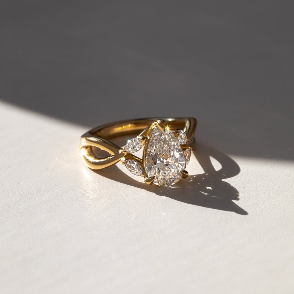 The Swirl Ring - Pear Twisted Band Engagement Ring