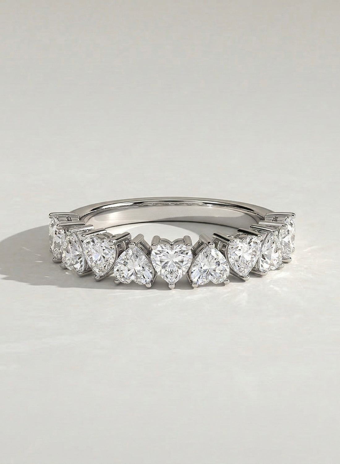 The Thessène Band- Heart Cut Half Eternity Band in Silver