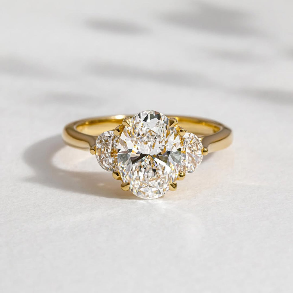The Trielle Ring - Oval & Face-Up Half Moon Trilogy Engagement Ring