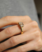 The Alina Ring - East-West Emerald Bezel Solitaire Ring