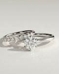 The Aria Bridal Set - Round Solitaire Ring with Curved Diamond Band