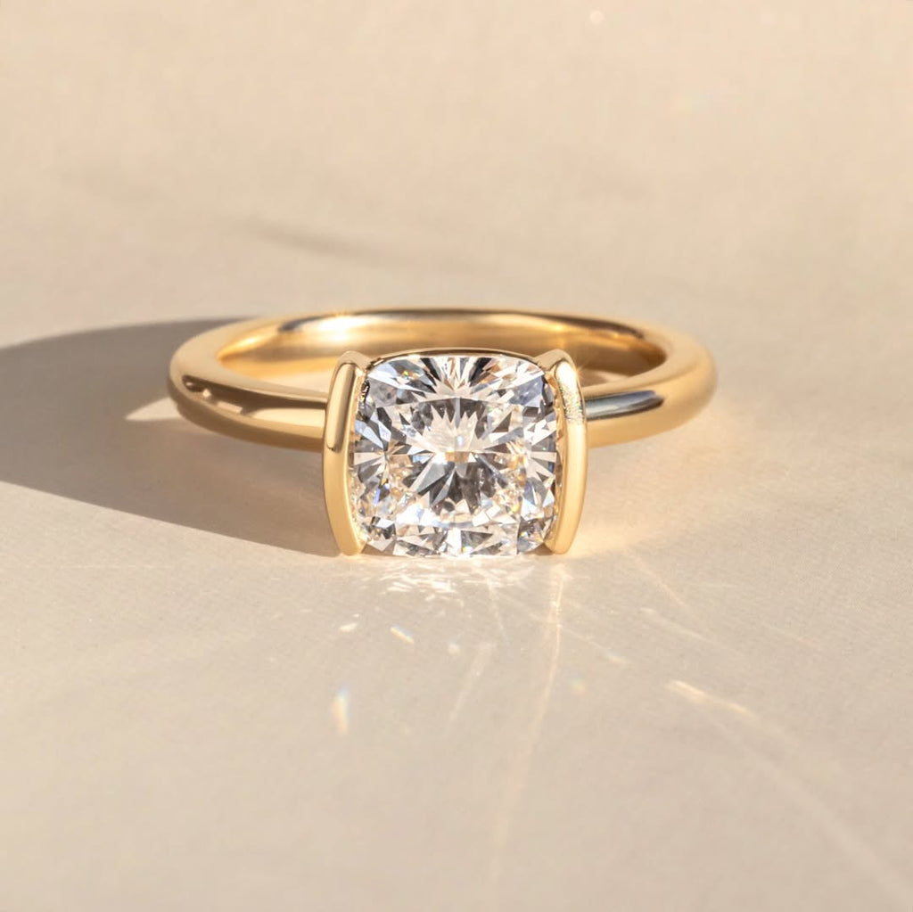 The Blair Ring – Cushion Cut Half Bezel Solitaire Engagement Ring