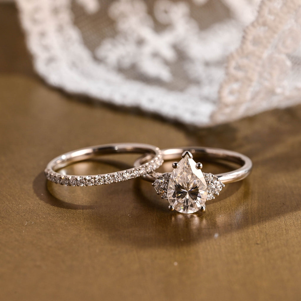 The Eliana Bridal Set - Pear Three Stone Ring with Pavé Wedding Band