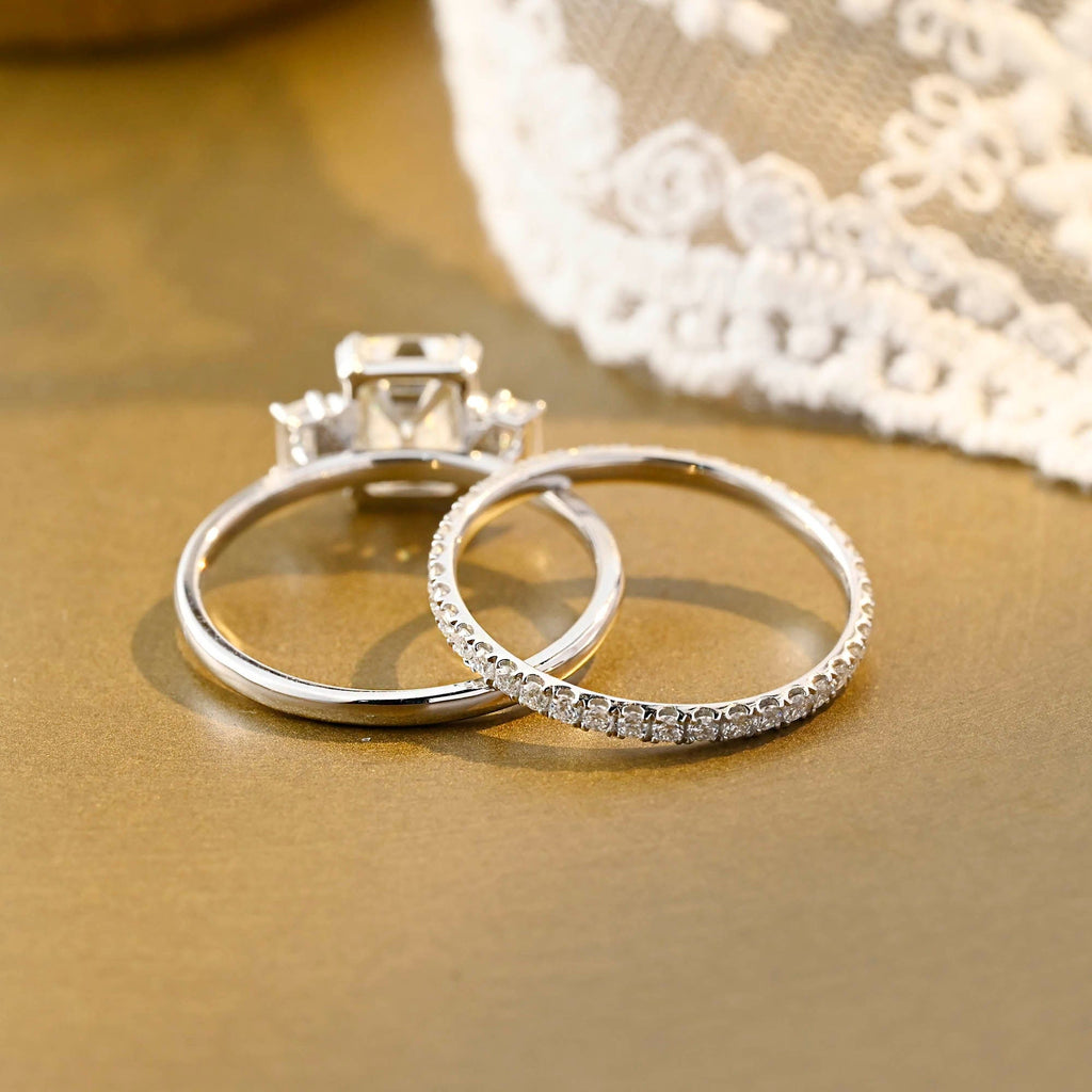 The Geneva Bridal Set - Emerald Cut Three Stone Ring with Pavé Wedding Band