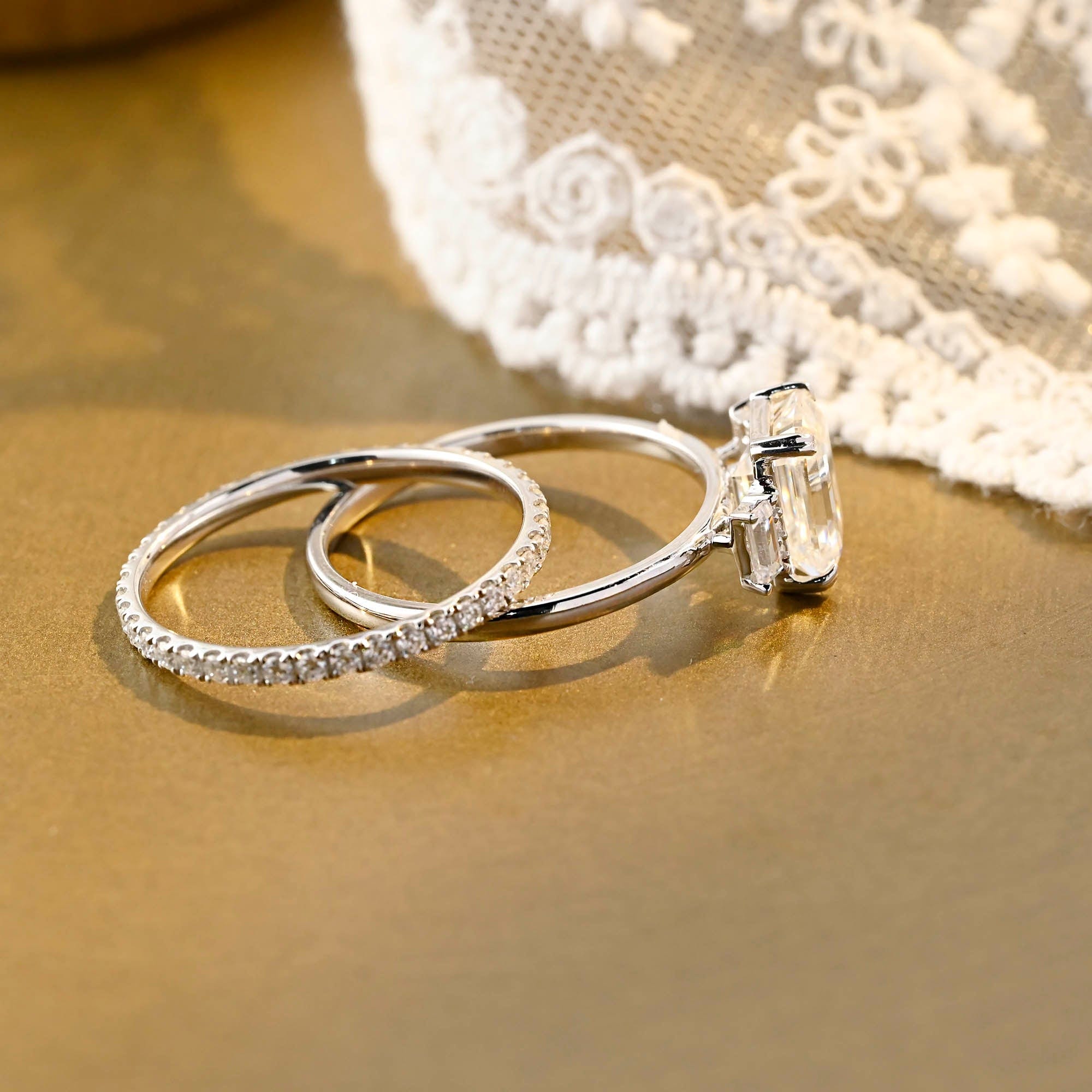 The Geneva Bridal Set - Emerald Cut Three Stone Ring with Pavé Wedding Band
