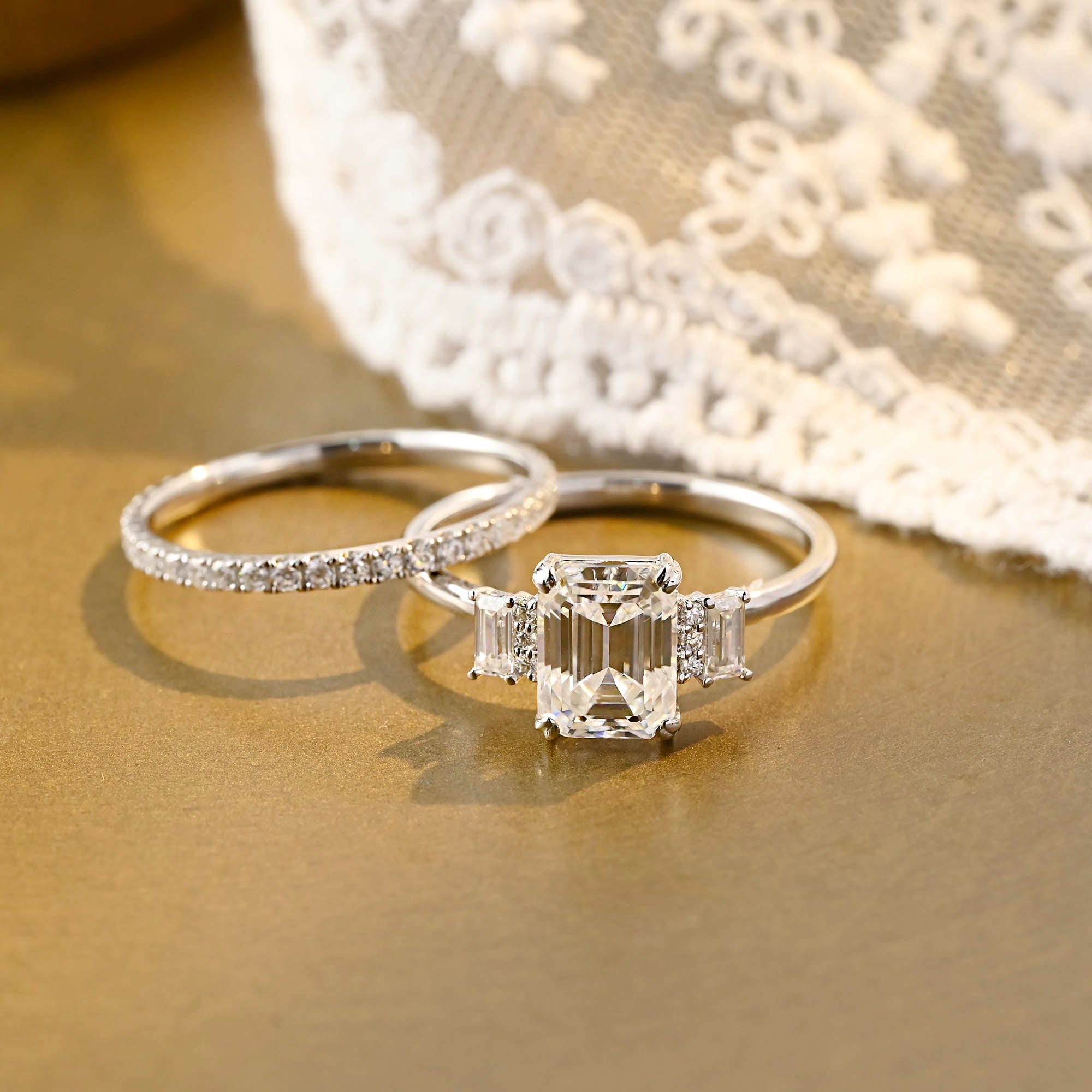 The Geneva Bridal Set - Emerald Cut Three Stone Ring with Pavé Wedding Band