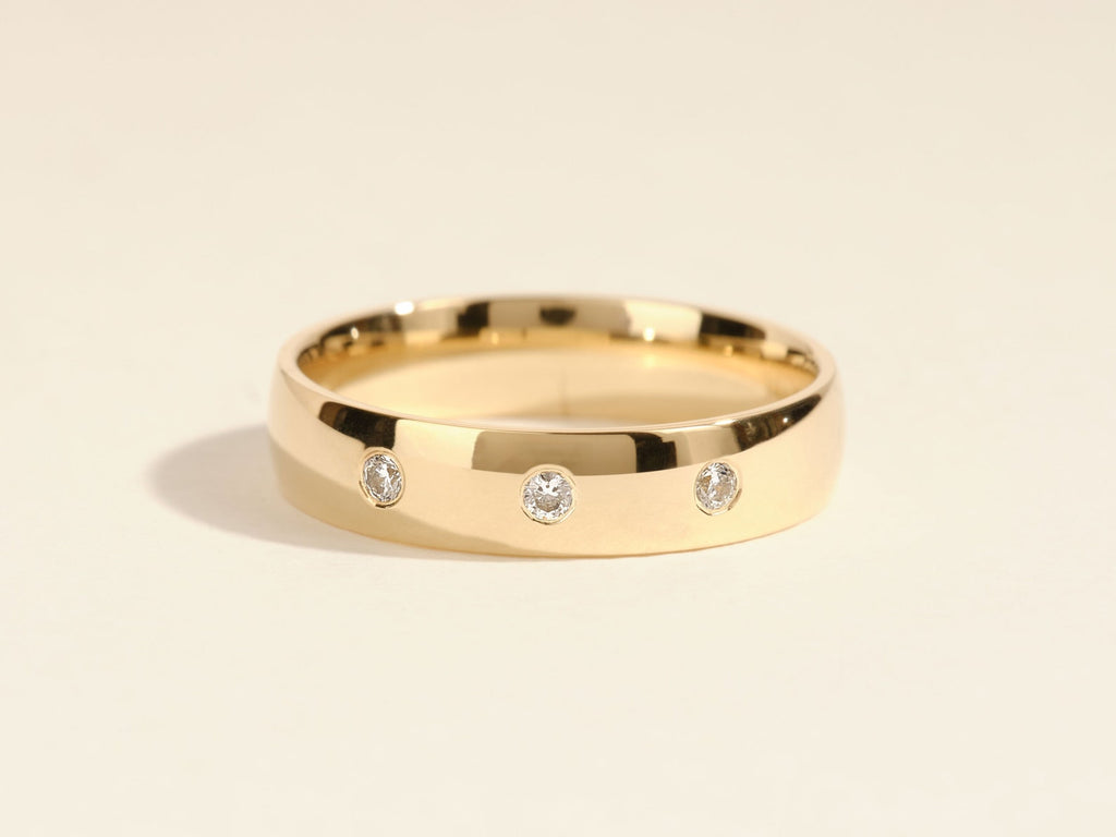 The Lucas Band - Three Stone Bezel Diamond Band