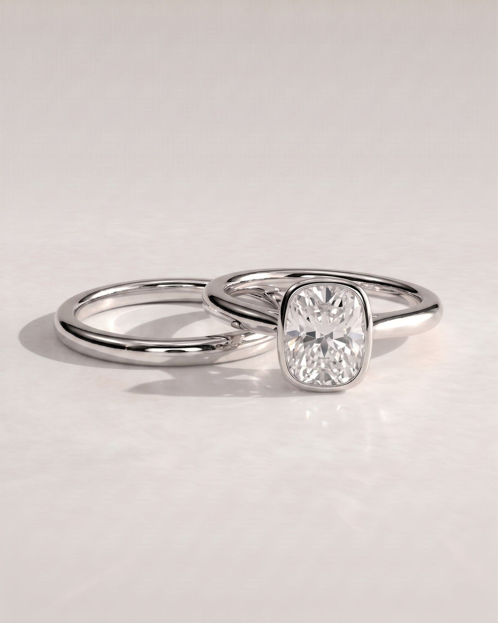 The Noelle Bridal Set - Bezel Cushion Engagement Ring with Wedding Band