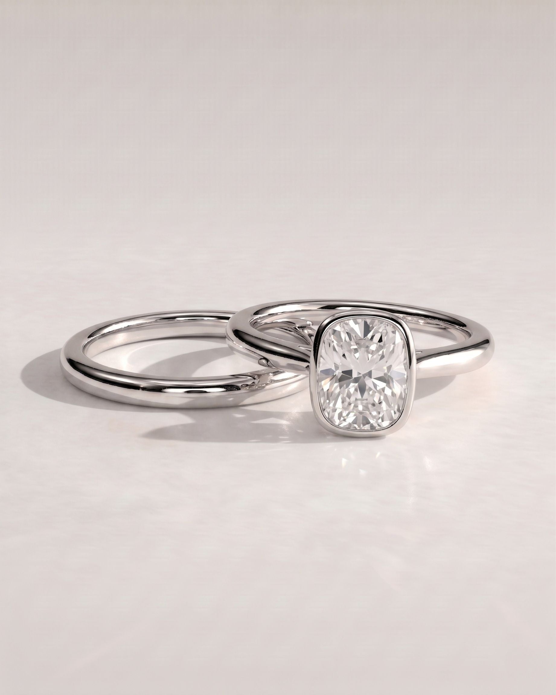 The Noelle Bridal Set - Bezel Cushion Engagement Ring with Wedding Band