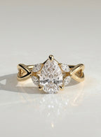The Swirl Ring - Pear Twisted Band Engagement Ring