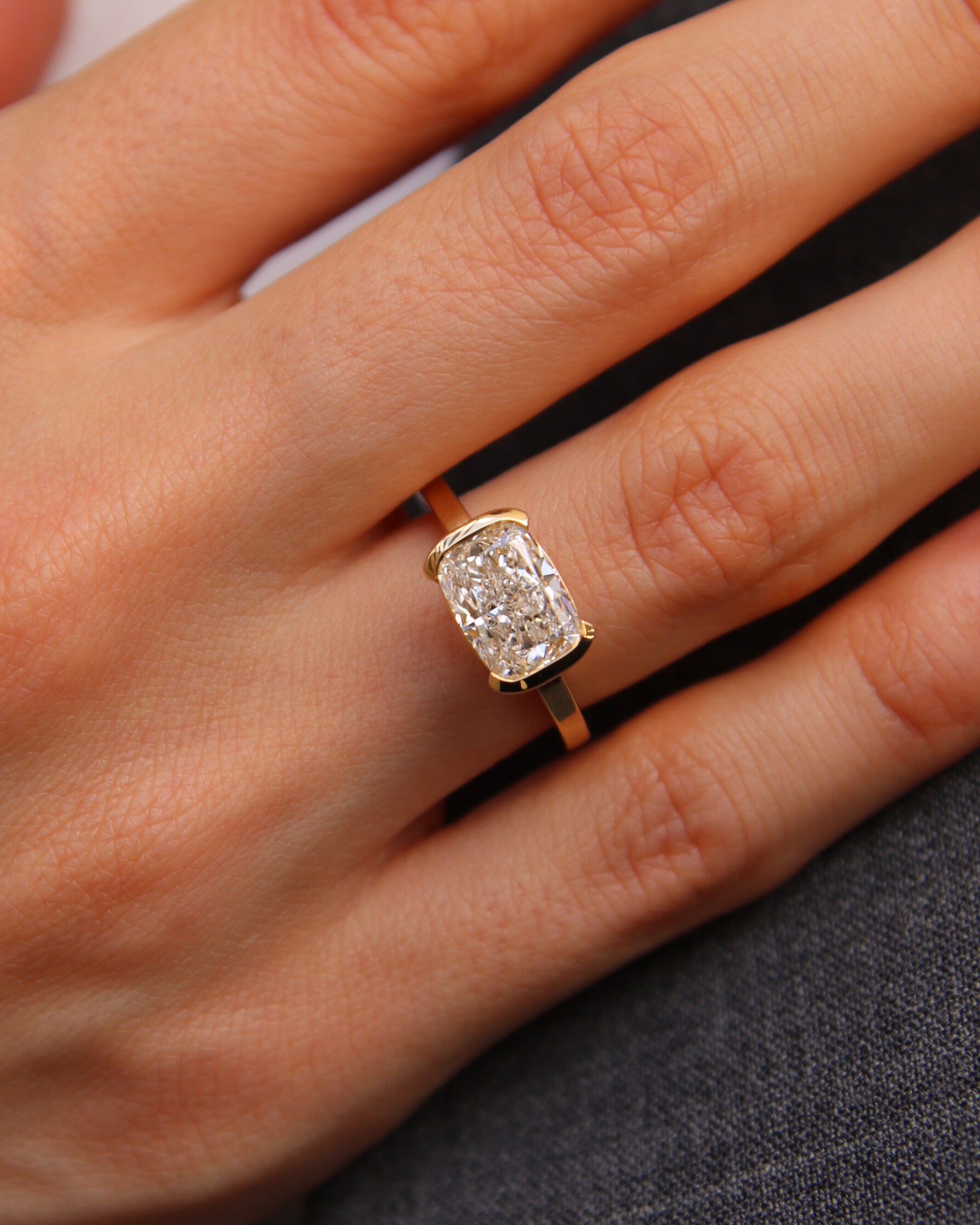 The Tessa Ring - East-West Elongated Cushion Semi-Bezel Ring