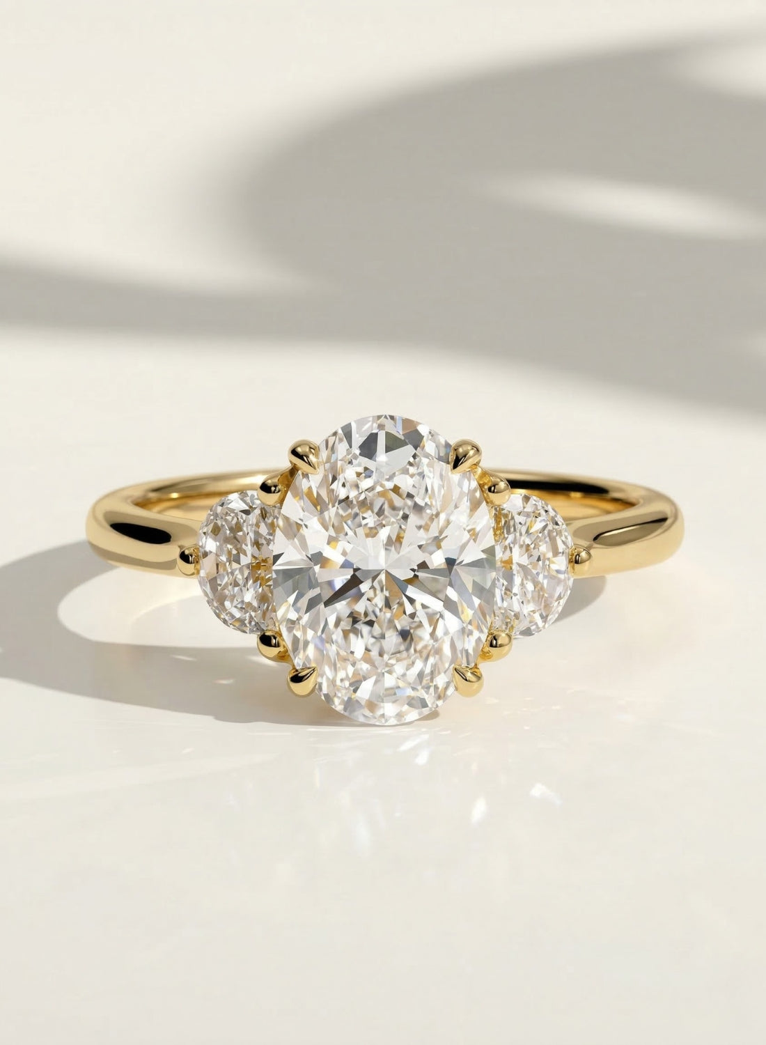 The Trielle Ring - Oval & Face-Up Half Moon Trilogy Engagement Ring