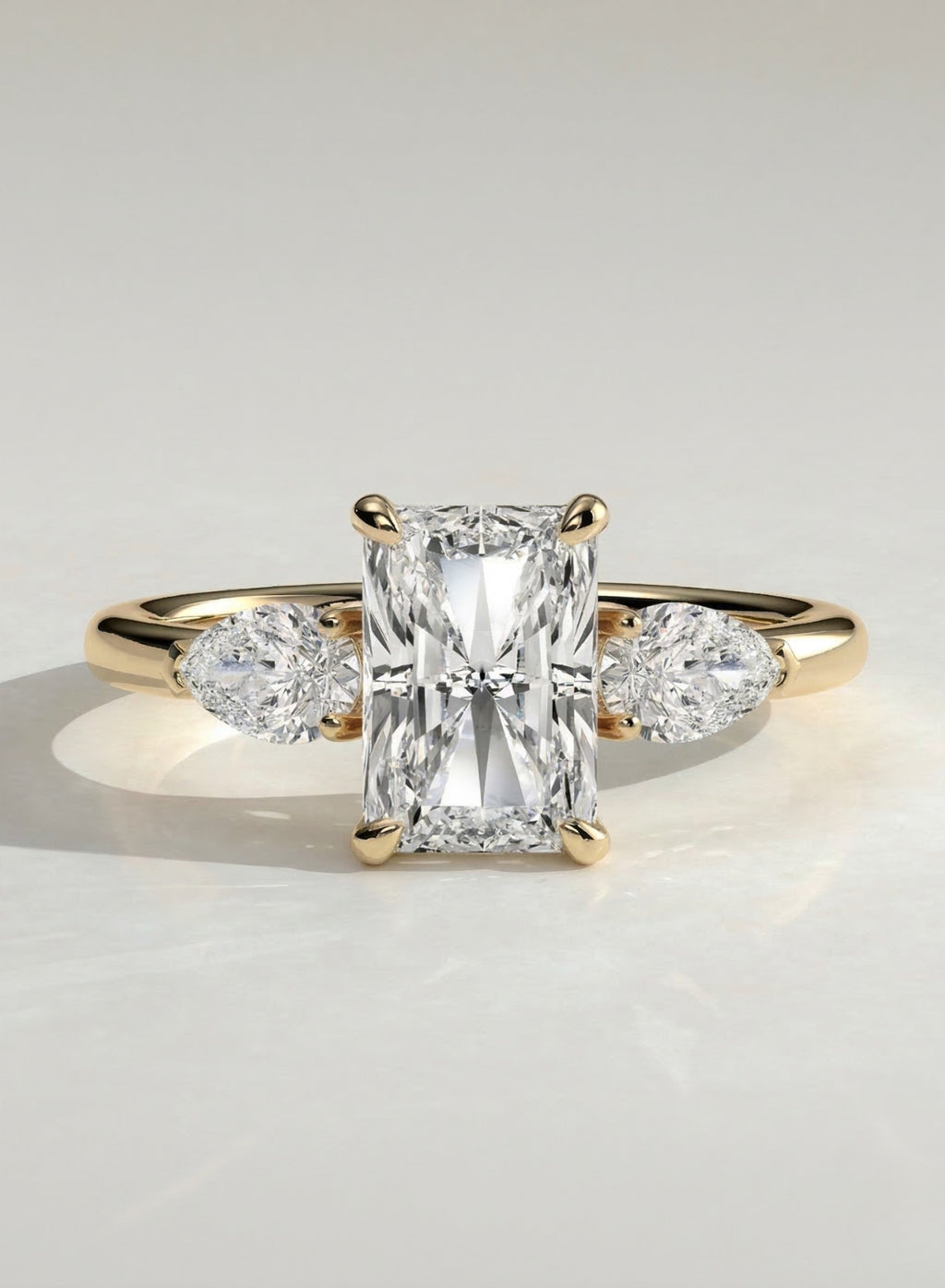 The Vesper Trio Ring - Radiant & Pear Three Stone Rings